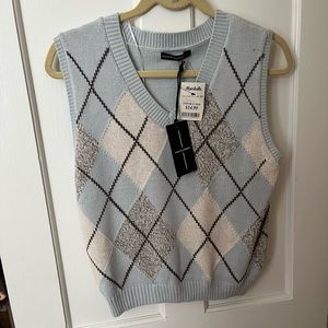 Light blue sweater vest